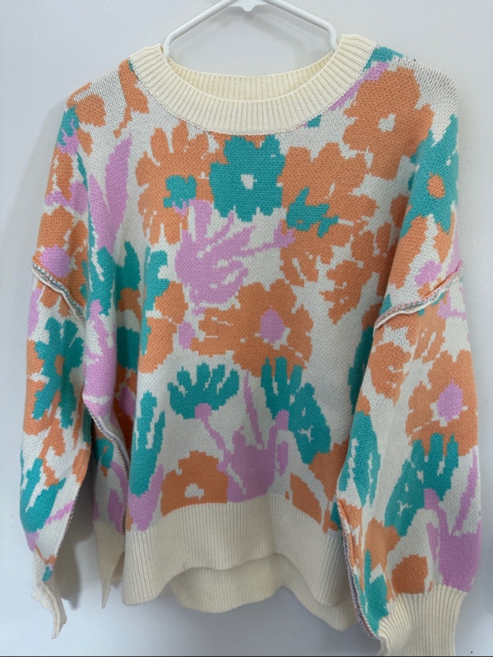 Cream Floral Knit Sweater with Teal, Orange, and Lavender Accents